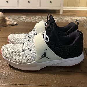 Jordan Black and White Sneakers with Red Accents